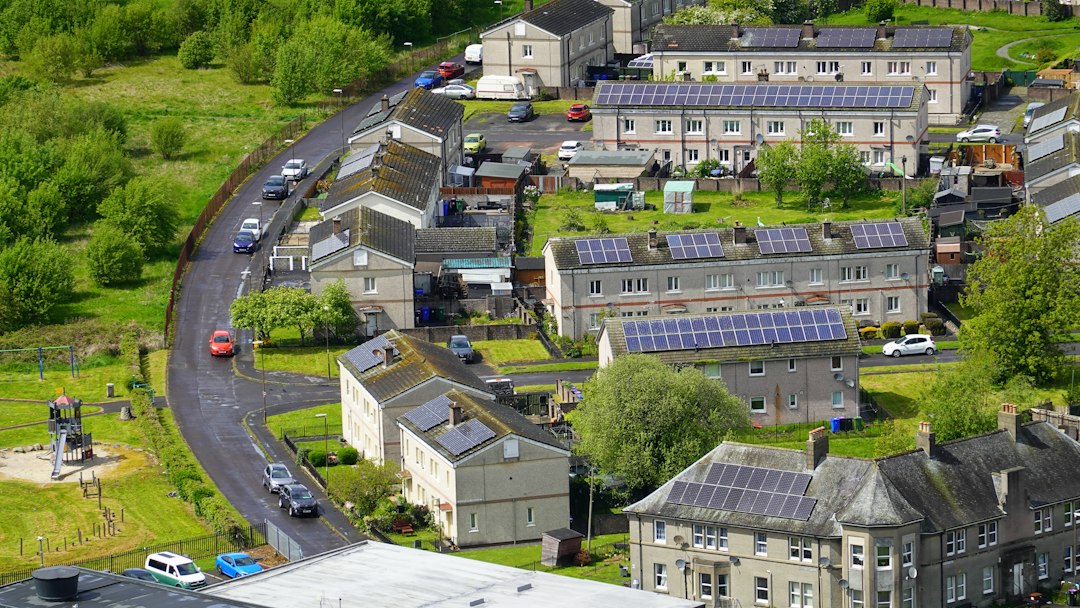 Homes with solar panels on grey rooftops - comparing solar panel quotes in Ireland