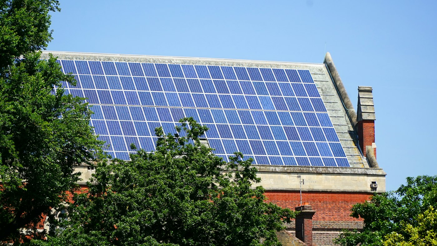 Large rooftop solar array on a farm building